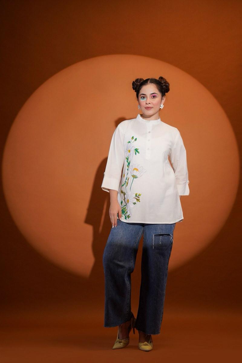 Urban Bloom: Off-White Embroidered Tunic with Denim